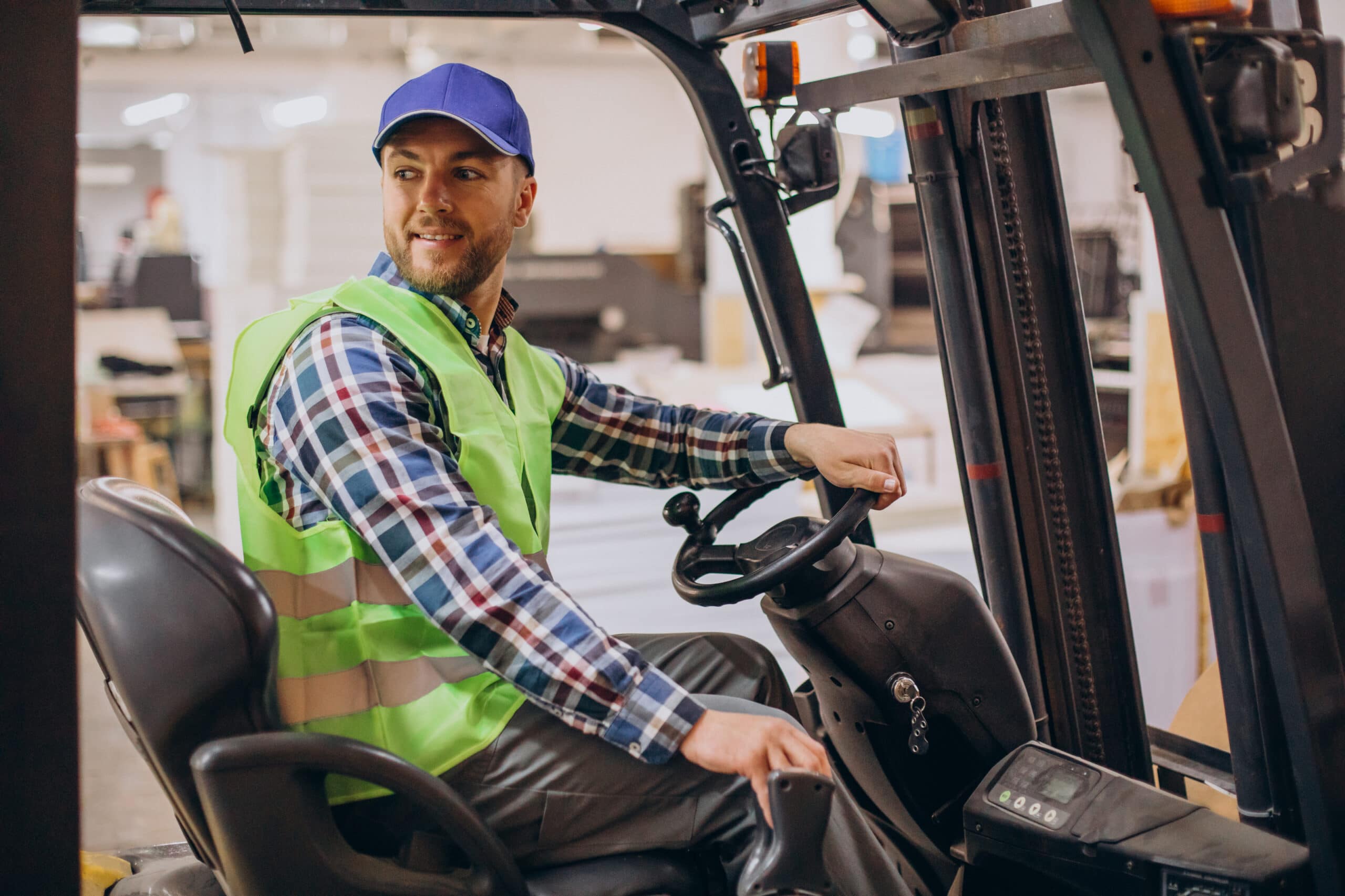 Factory worker in lift