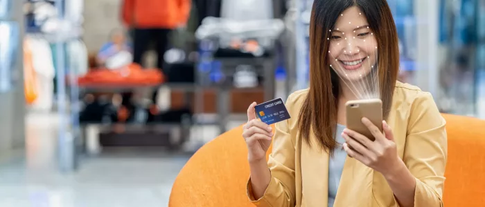 Woman paying with frictionless payments